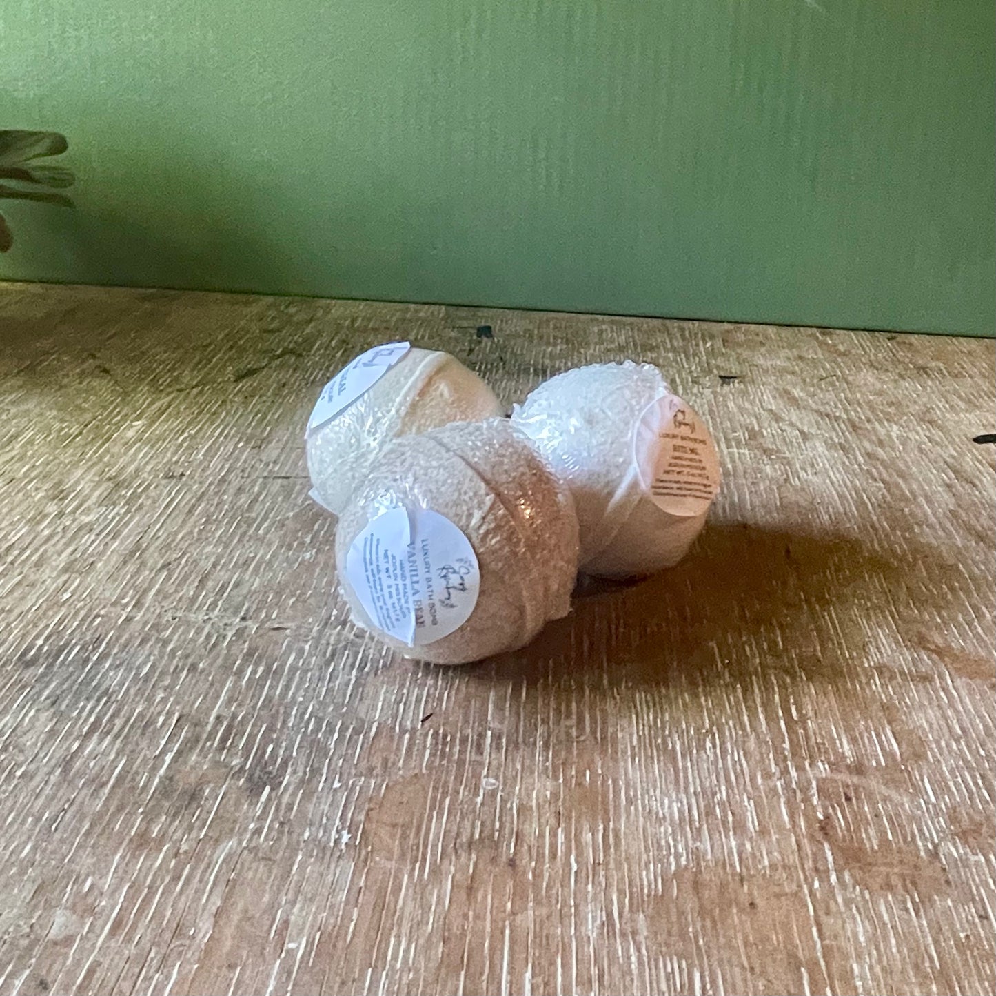 Three round bath bombs.