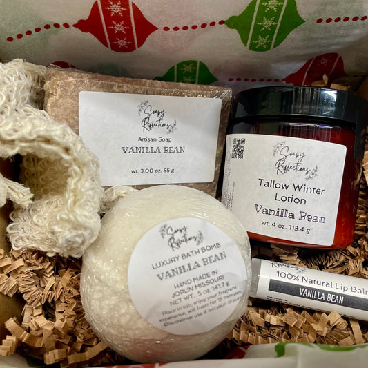 Gift box including bath bomb, lotion, soap, lip balm, and sisal soap bag. Vanilla bean scent. 